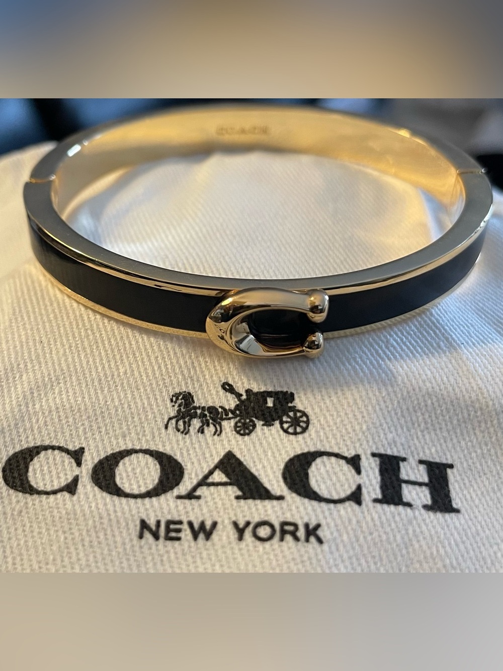 Coach Gold-Tone Bangle with Black Enamel Inlay… includes dust bag